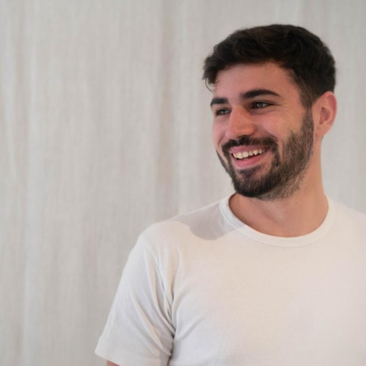 Milo Singh, Client Relations Director, discussing corporate gifting strategy with business clients